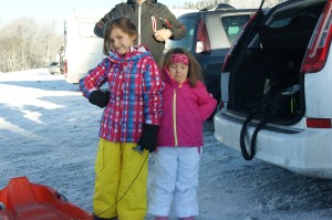 My girls kitted out in snow-pants and ski-jackets, Beth wearing a headband looking far too classy!